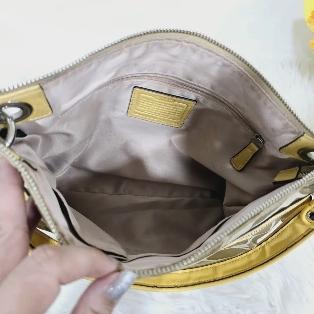 Coach yellow and tan satchel bag
